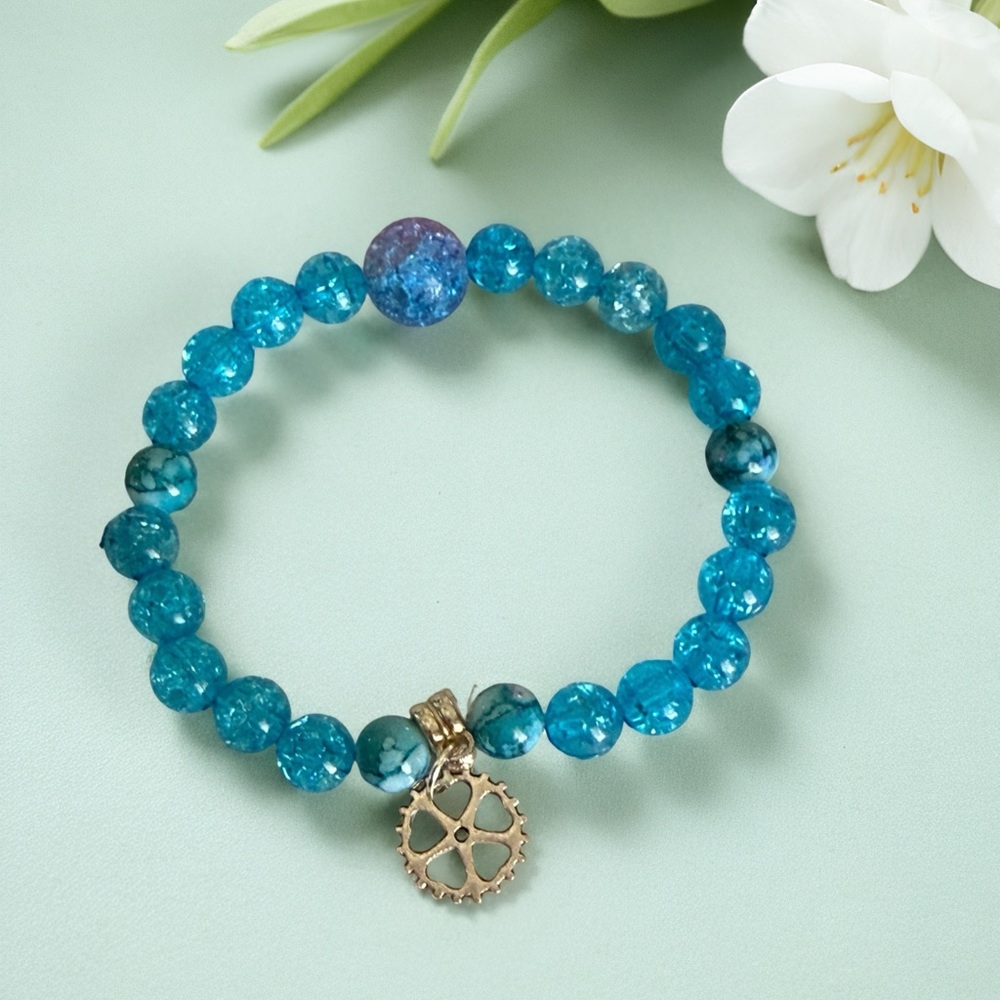 Hand Crafted Turquoise Blue Beaded Bracelet with Silver Gear Charm - Picture 2 of 3